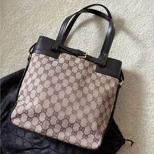 Vintage Gucci GG canvas and leather tote bag with buckle details